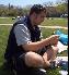 Chris sitting on the grass [click to enlarge]